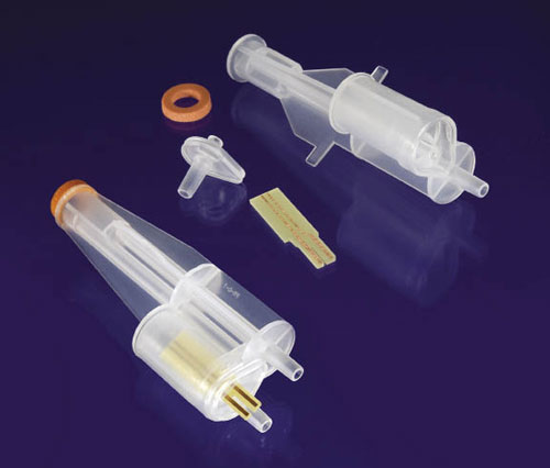 An electrode fits into two slots in the medical grade polypropylene cell body.